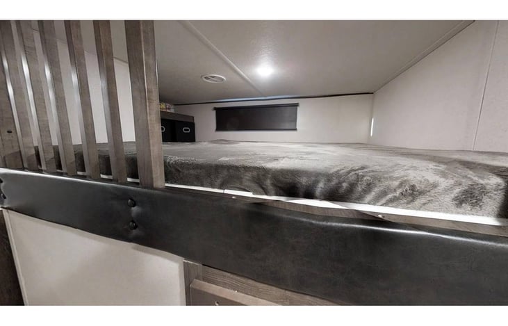 LARGE upper sleeping area fits smaller adult or 2 children.