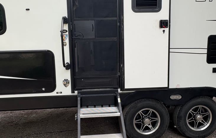 RV inside access with adjustable staircase