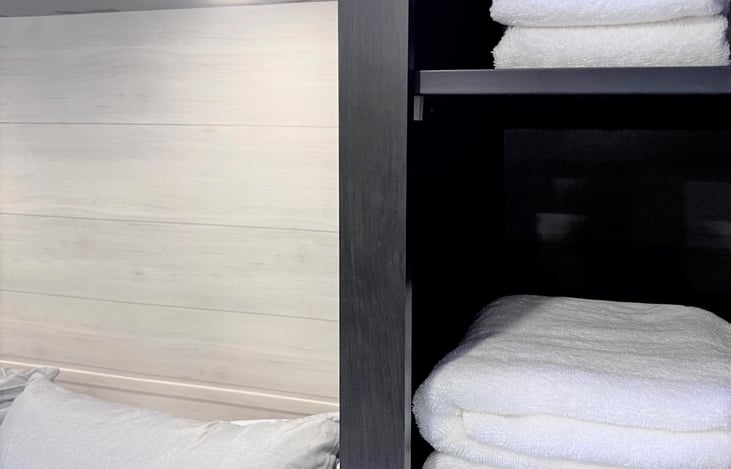 (4) bath towels and (4) hand towels.