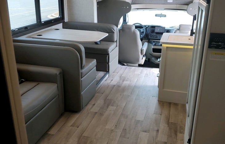 Seat belts throughout unit, including dinette table and theater seating. Dinette seating equipped with child safety seat tethers.