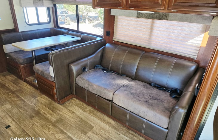 Living room- Fold out couch and table bed.