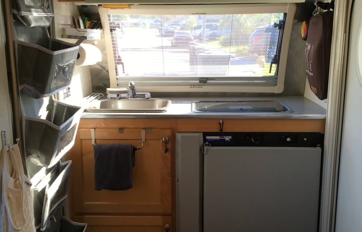 Kitchen  with fridge and side organizer