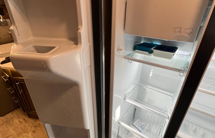 Freezer with ice maker.