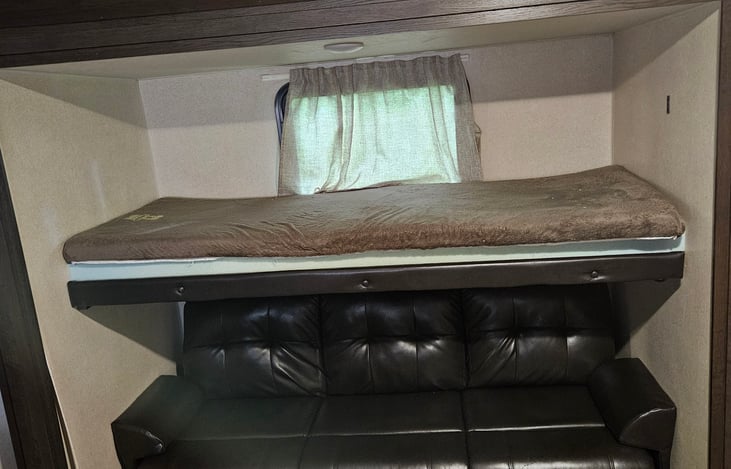 Bunk and jackknife couch in rear bunk house room