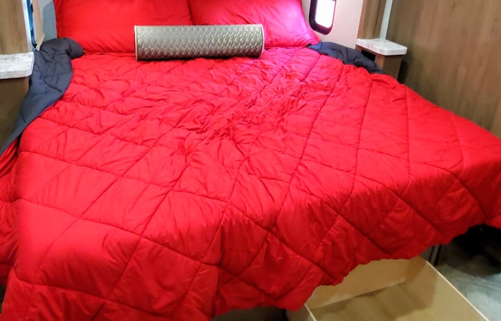 Storage over and under the king size bed.