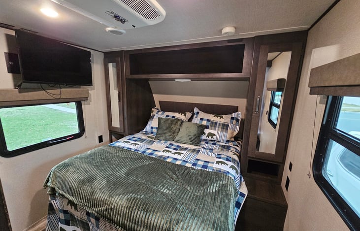 Private Bedroom Displayed with Roku mounted TV