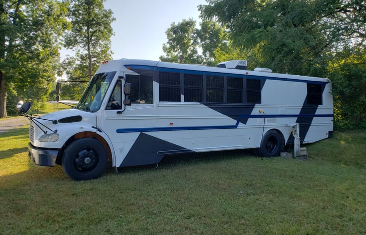 Tool box, outdoor shower, electric hookup, water connection, waste dump, propane fill