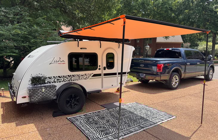 Our newly installed 8x10 awning, outdoor rug, chairs, and table, combined with your personal gear, create a cozy outdoor living space perfect for making great memories.