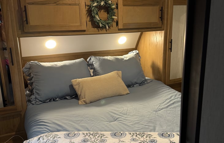 Bedroom with queen bed with 3 inch memory topper