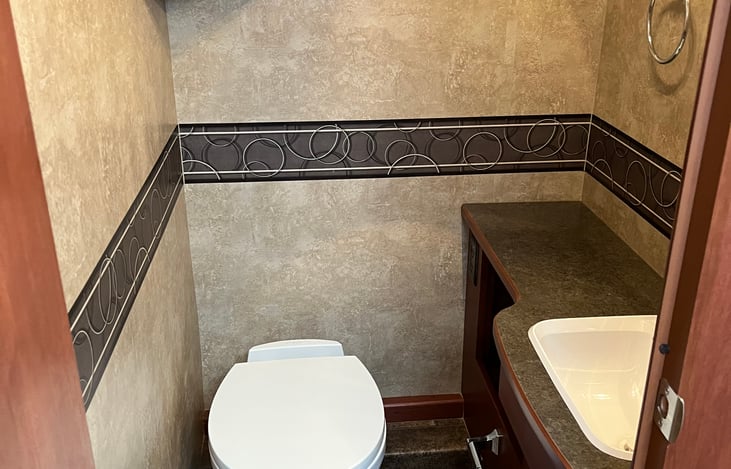 private bathroom with sink and vanity