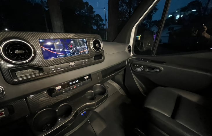 Spacious seating for passenger. Climate controls under MBUX screen are easy to use and make the cab comfortable in any environment.