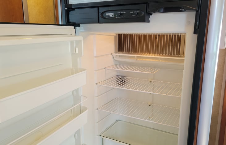 For a small refrigerator the storage in here is surprising.  crisper bin and thermometer to maintain proper temperature.