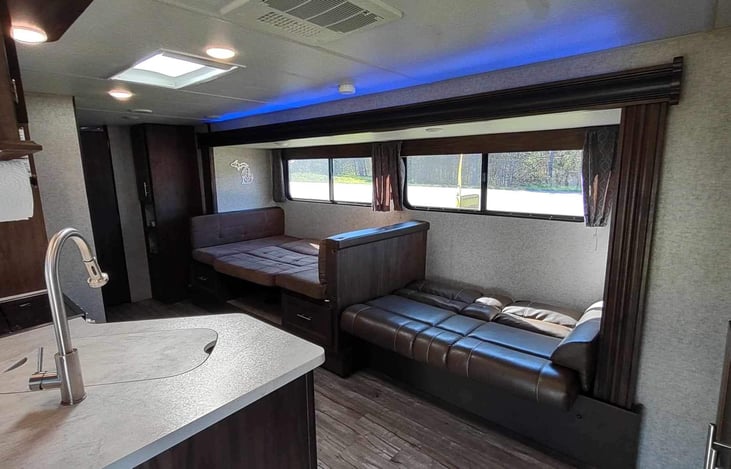 Dinette and couch folded into beds