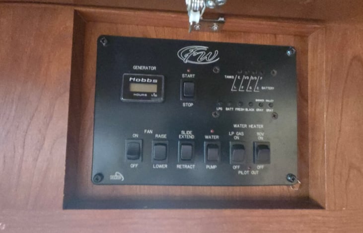 All easy to control manual switches including generator hours, water pump for freshwater tanks, slide out extensions, gas hot water heater as well as Electric.