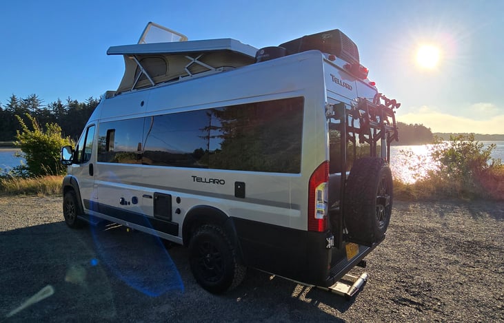Rear, with Thule bike rack and beefy spare tire.
