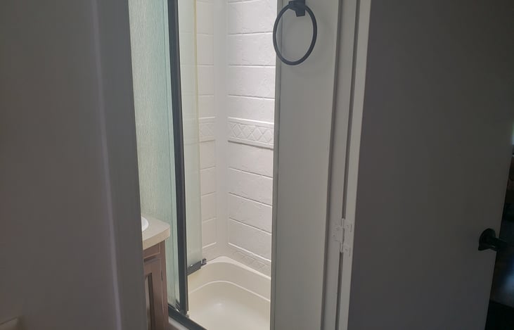 The tub with a shower is 3 feet wide! Also has a skylight.