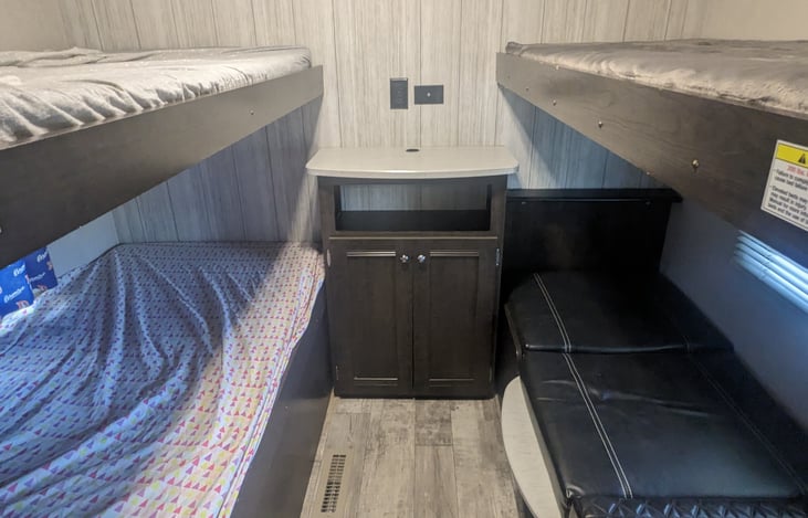 4 bunks, or fold bottom right bunk into dinette.