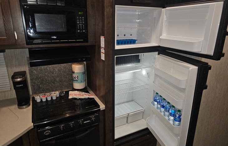 Some included extras. Water bottles, hot chocolate, and coffee pods for the Keurig.