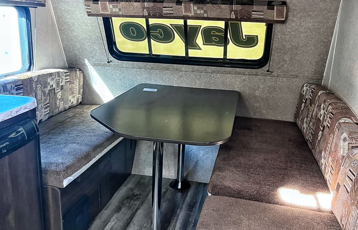 The table flips down to turn into a full sized bed