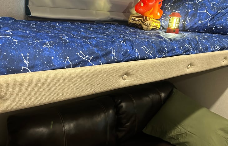 Kids bunk bed with jack-knife sofa (also serves as a bed).