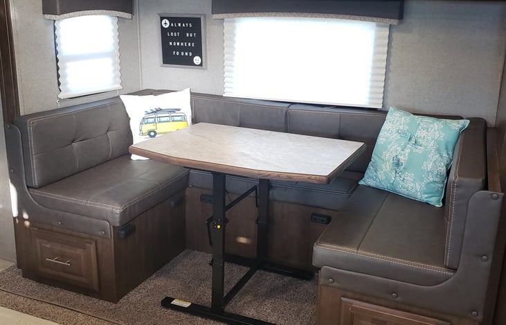 4 - 6 person dinette.  A great space for meals or family game night!

Also converts to very spacious bed.