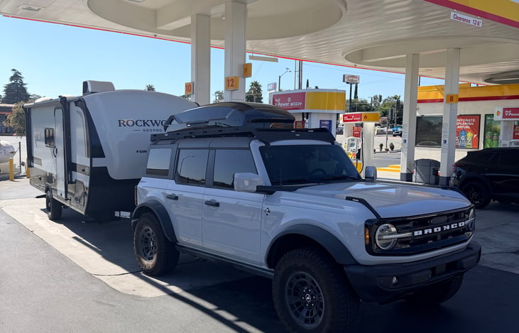 Fueling up on the way out of town, with the TOR Bronco doing the towing.