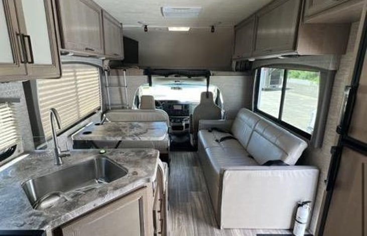 Roomy living space with Jackknife Sofa and a fold down dream dinette for extra sleeping