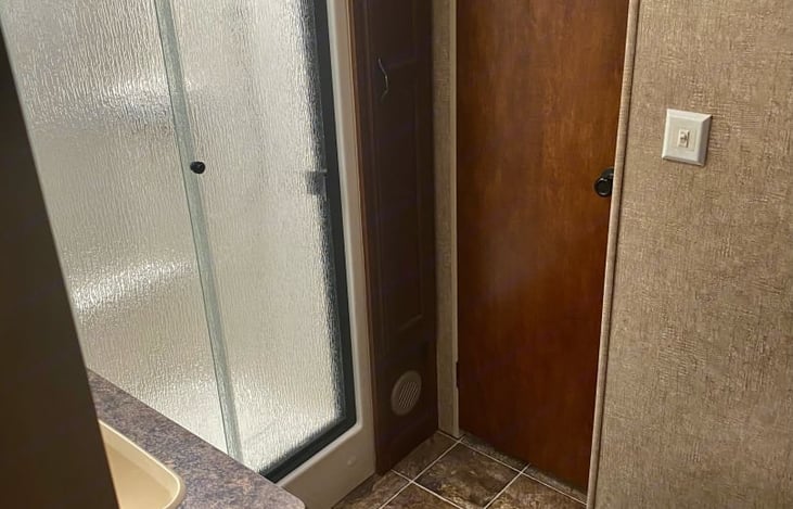 Nice size bathroom  Includes fresh bath towels, hand towels, and wash cloths.  Hand soap and TP too.