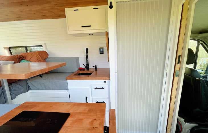 Full enclosed private shower and cartridge toilet for both #1 & #2. Easy slide privacy door, instant hot water with temperature adjustments.