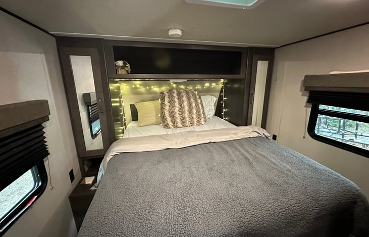 We added a queen sized mattress on top of the standard rv mattress for comfort purposes. It is a bit high off the ground so if this would be an issue we can easily take it off before pickup.