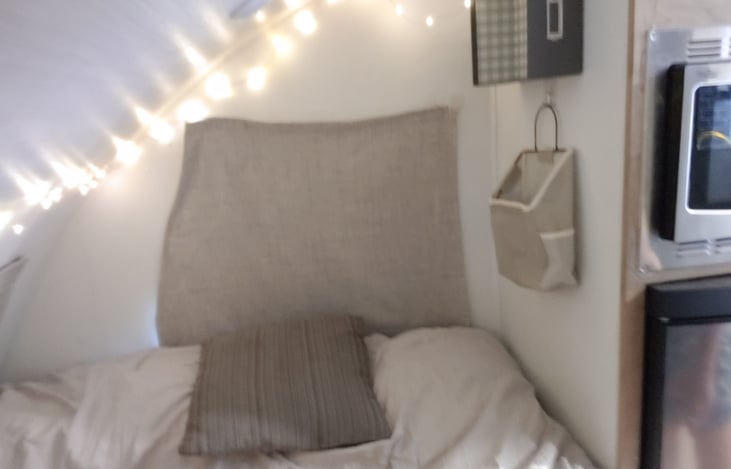 For nighttime, tiny lights, velcro window coverings/room darkening and wall storage for your wallet, books and phones.