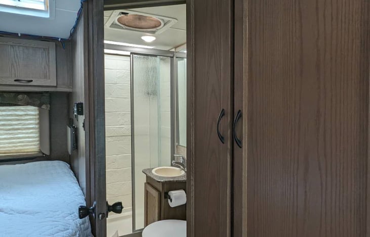 Full bath room with sink, shower and toilet.  Upgraded to Sun-Mar Urine Diverting/composting Toilets so you can go off-grid.