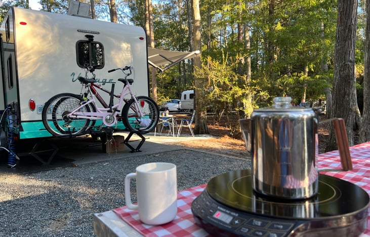 Coffee pot and cups included.