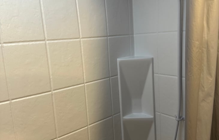 Shower! Nothing beats a hot shower! Has a stopper plug to make it a tub for a toddler!