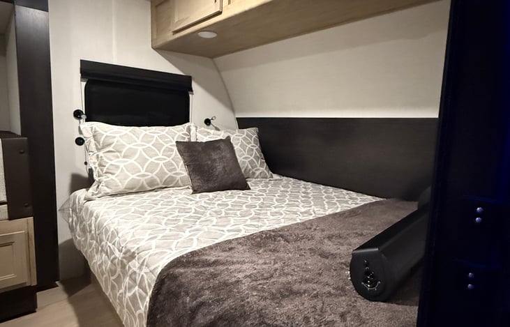 Queen bed - upgraded new mattress and bedding. USB chargers and reading lights located at the head of the bed.