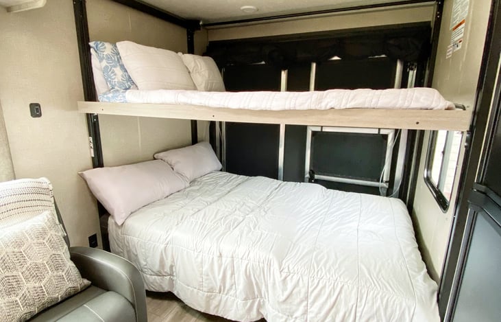 Benches below can flip all the way over to create another sleep space