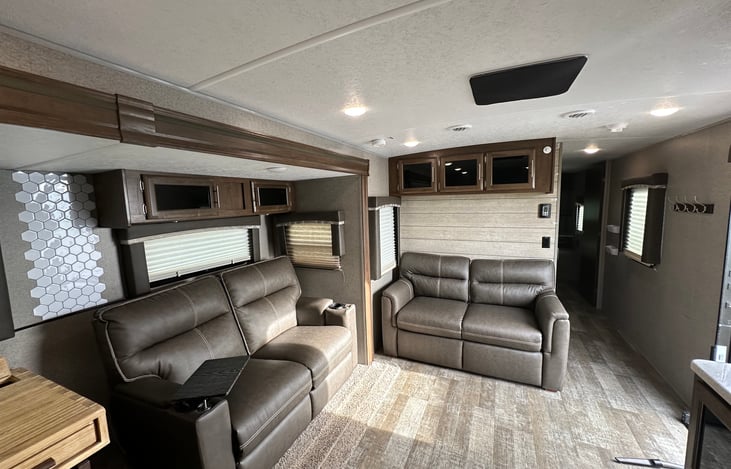 Living room area- includes heated massage love seats
