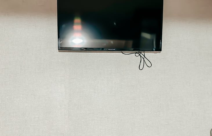 TV with dvd player in main bedroom