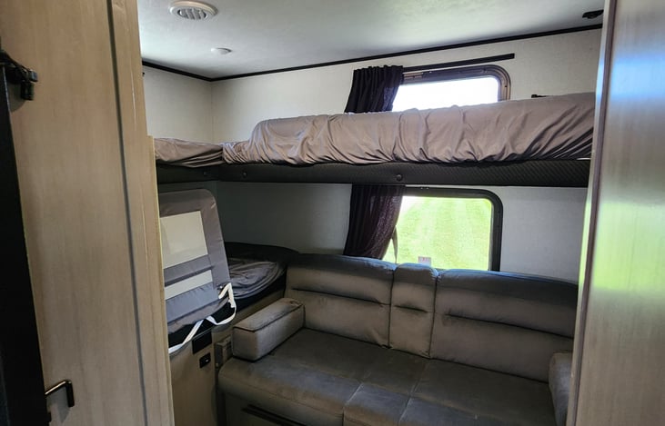 Bunk room with 3 bunks and fold down sofa/bed