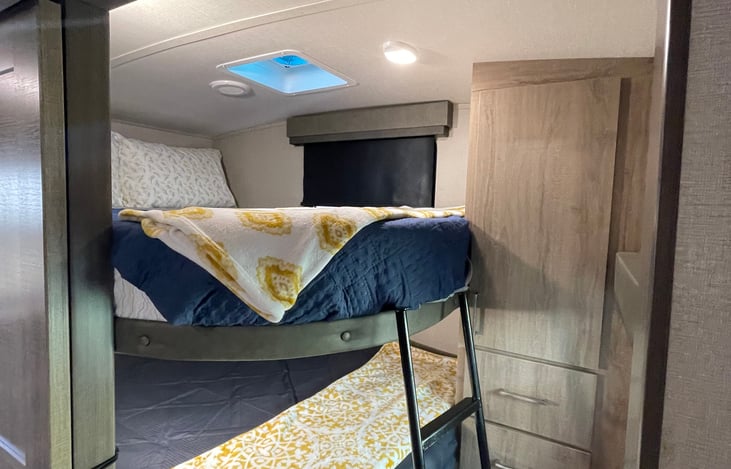 Double bunker with upgraded mattresses.(Fire escape window)