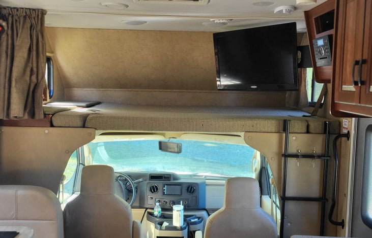 Queen size bunk and 32 inch television