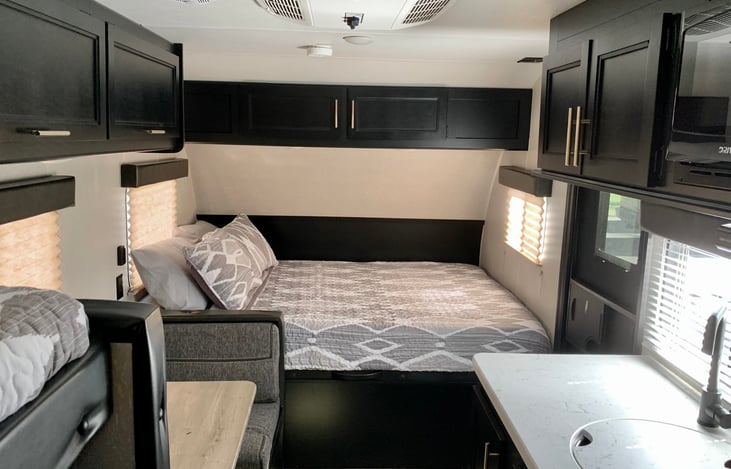 The front RV Queen size bed is upgraded with a Super
Comfy 8” Memory Foam Mattress!
