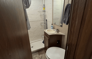 Adventure-Ready Coachmen 220QB w inflatable Kayaks