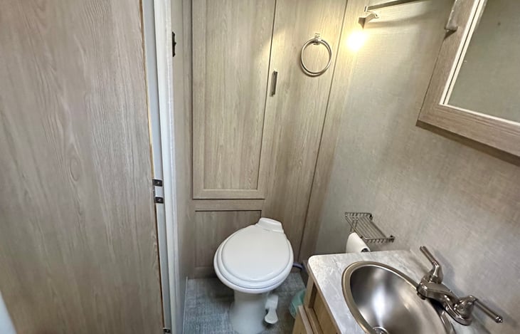 Flushable toilet and sink. Plus lots of storage space!