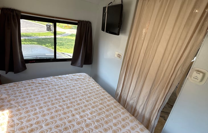 Private bedroom with privacy curtain drawn.