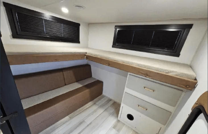 Private bunk room with convertible bunks that lift to be out of the way when not in use.