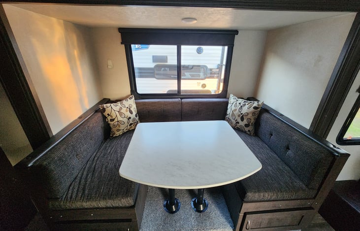 Spacious Dinette table that converts into a double bed.