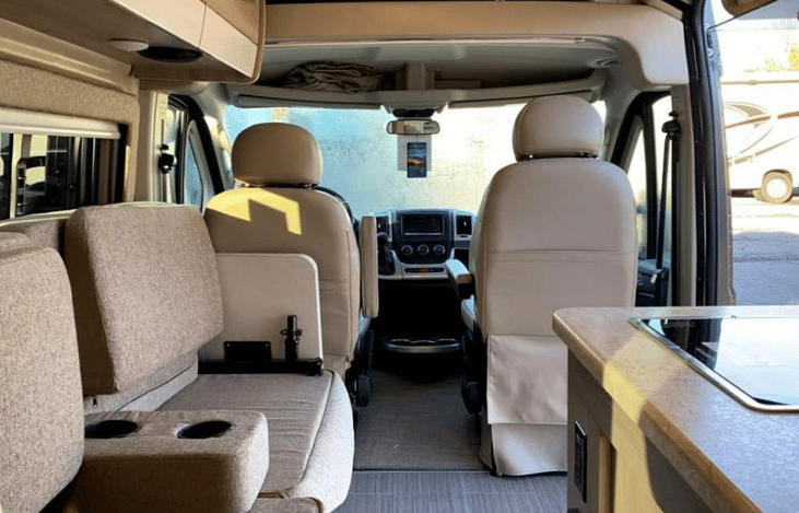 Sofa (to the left) has two seat belts