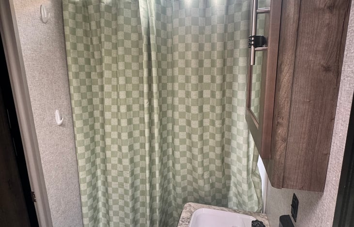 Full shower with small bath tube as well!