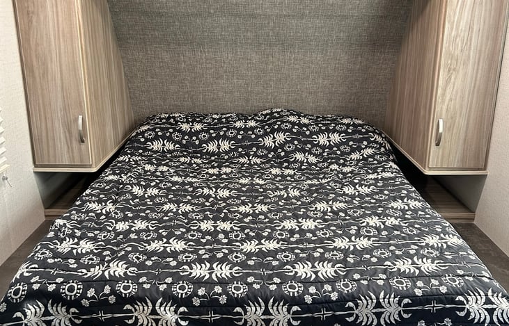 Here is the full size Murphy bed pulled down. There are USB plug-ins on each side.